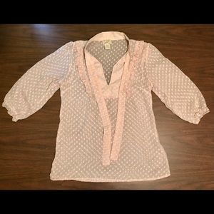 Sheer pink blouse with ruffled collar